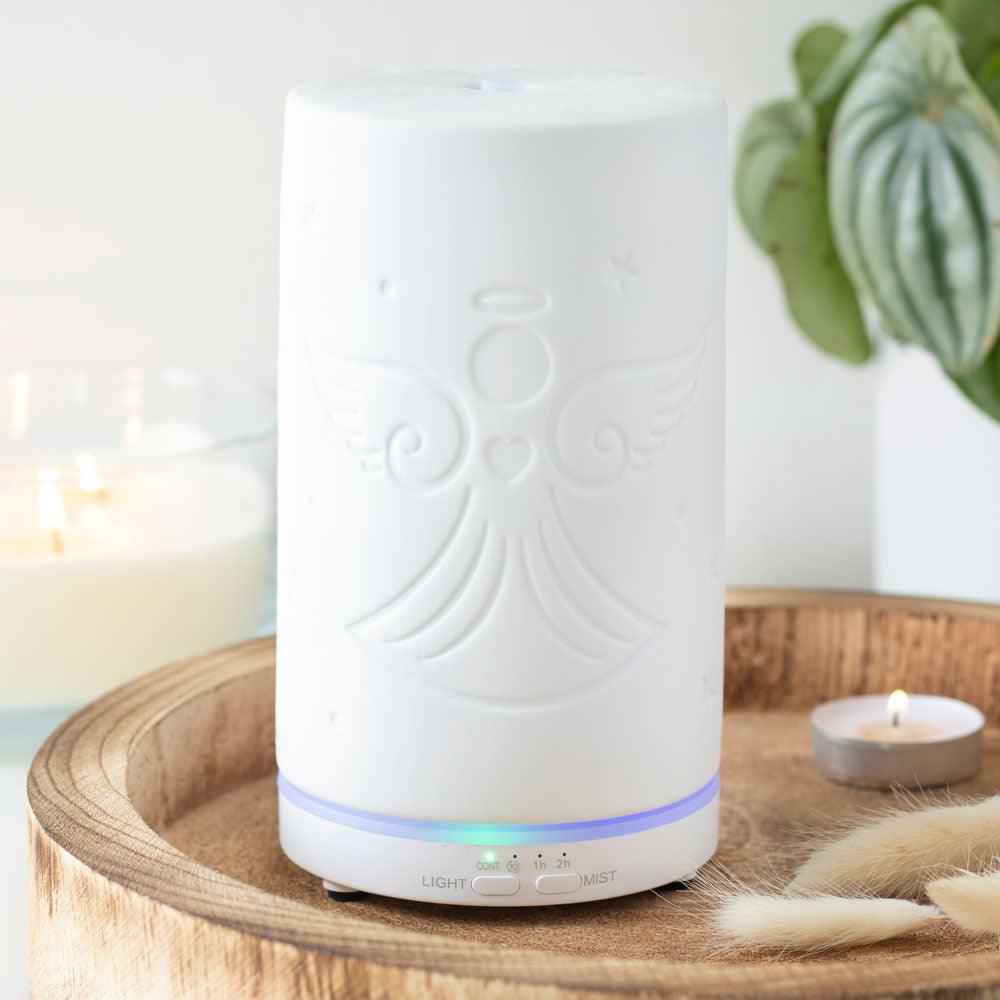 White Ceramic Guardian Angel Electric Aroma Diffuser - Charming Spaces